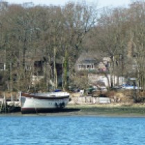This house & boat are just outside the entrance to Birdham pool Marina in Chichester Harbour